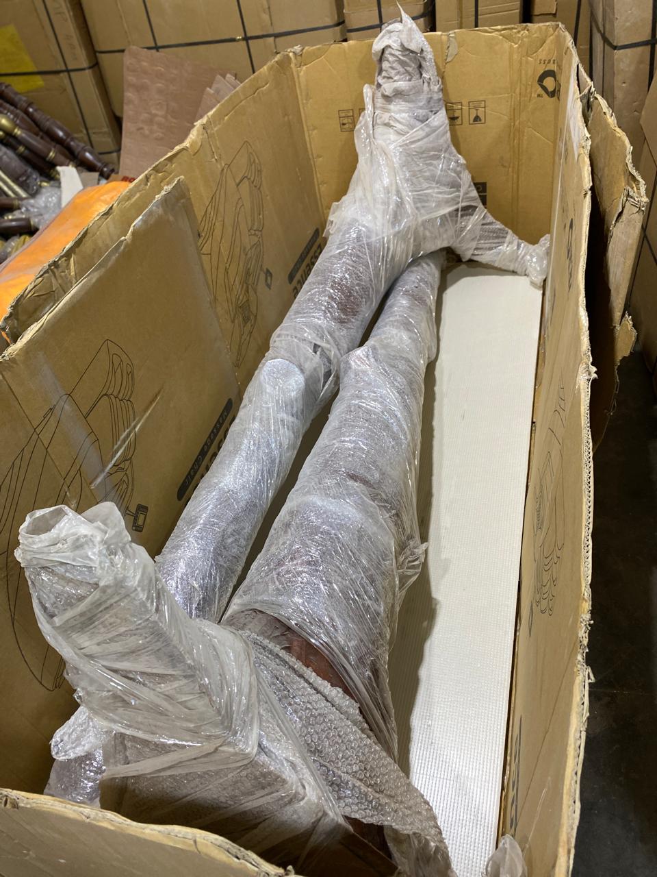Carved wooden sofa legs individually wrapped in bubble wrap and foam for USA export