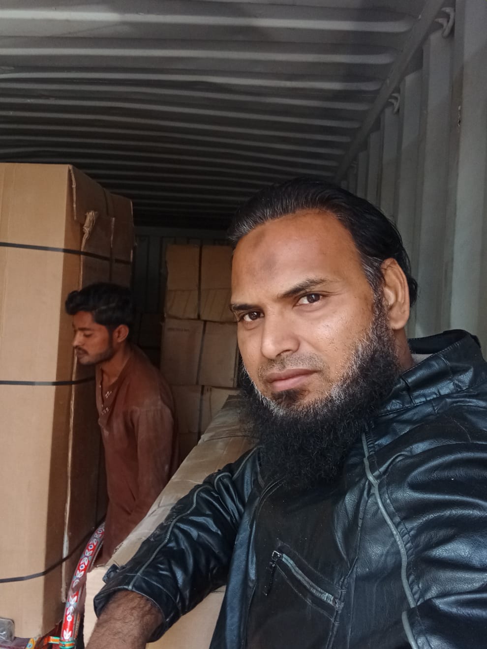 Muhammad Zeeshan Sharif personally supervising container loading for USA shipment
